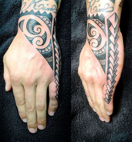 Fotos e Imagens de Tattoo Tribal Masculina na Mão